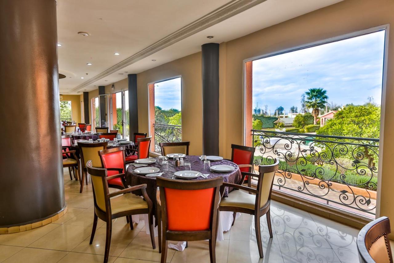Hotel Al Bassatine Beni Mellal Bagian luar foto